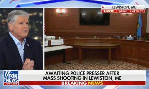 still of Sean Hannity; live footage of Lewiston, ME press conference; chyron: Awaiting police presser after mass shooting in Lewiston, ME