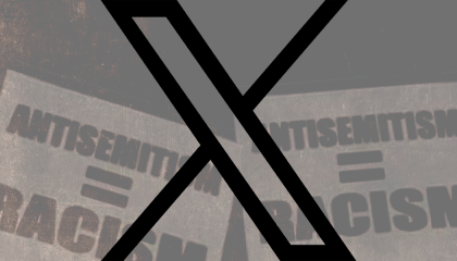 X logo over signs that read "antisemitism equal racism"